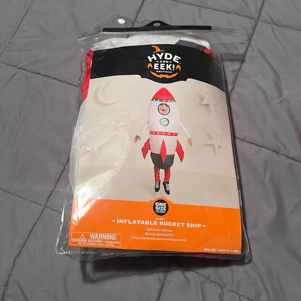Never used. Taken out for pic. Inflatable rocket ship